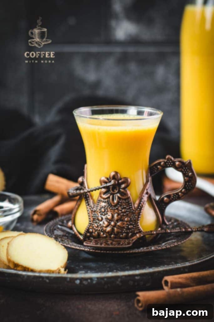 A beautiful coffee cup filled with spiced almond milk