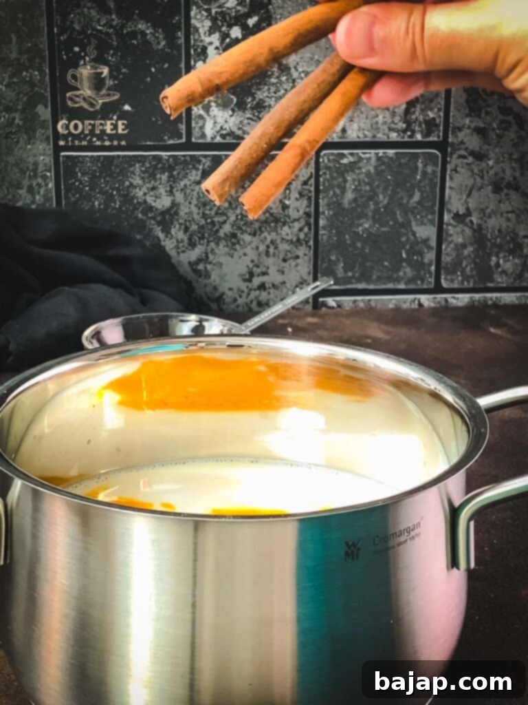 Add the cinnamon sticks to the almond milk.