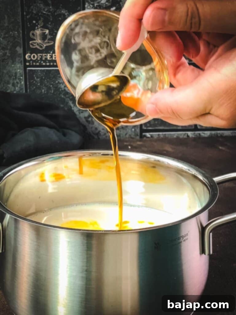 Add the maple syrup to the almond milk.