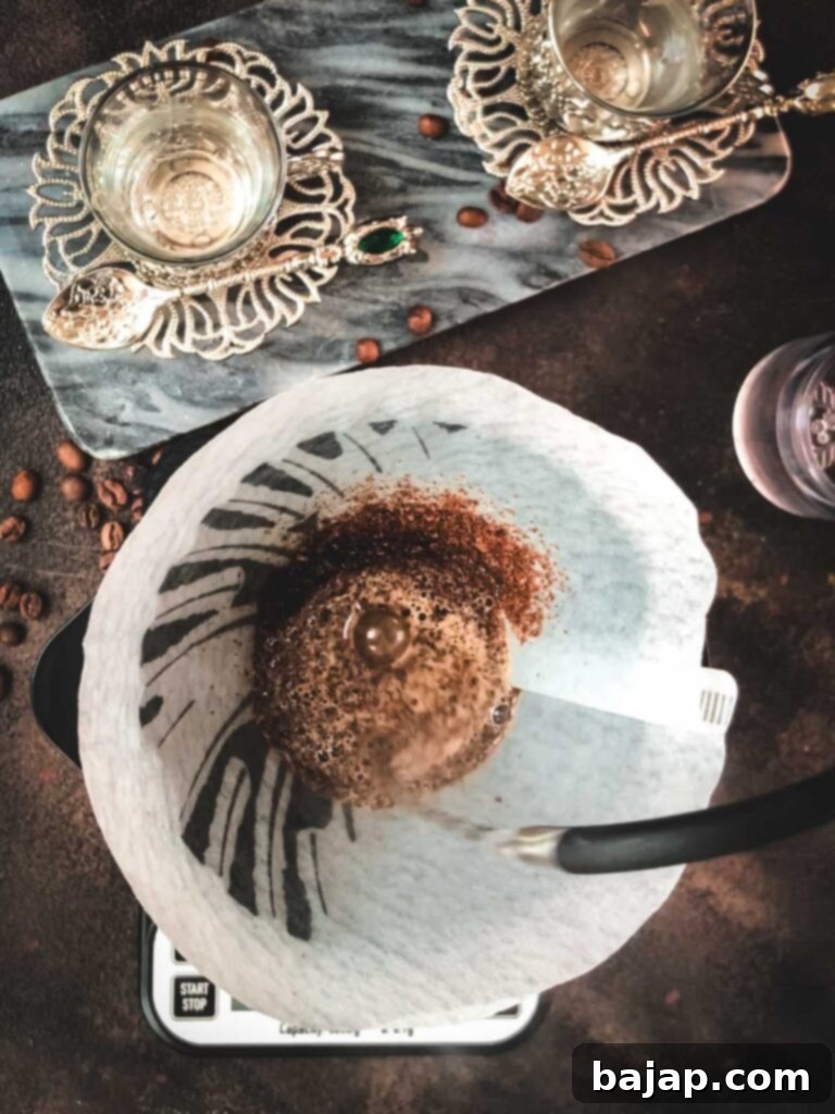 V60 Pour-Over: The Art of the Perfect Cup 5 Close up of the coffee blooming phase in a V60.