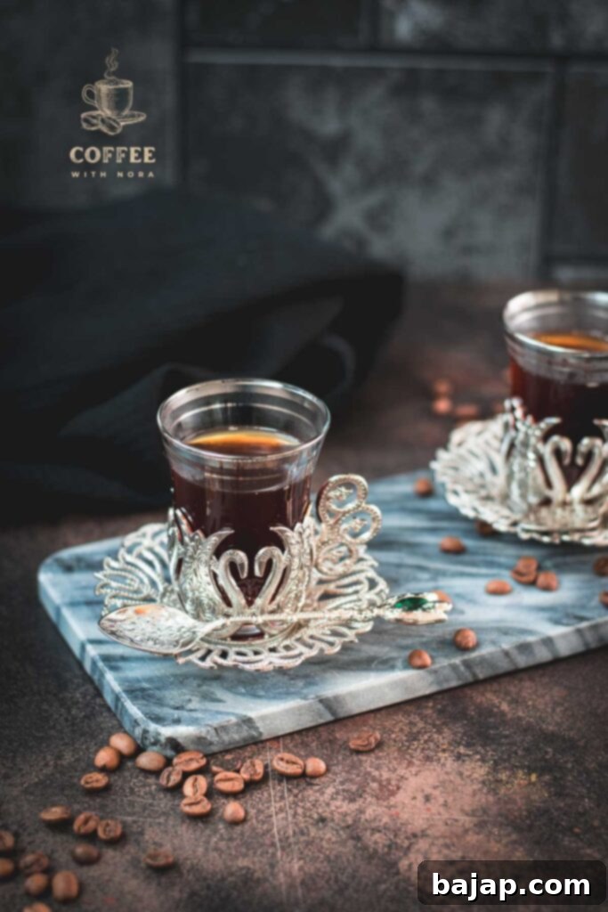 V60 Pour-Over: The Art of the Perfect Cup 9 Close up of specialty coffee in a glass on a marble plate.