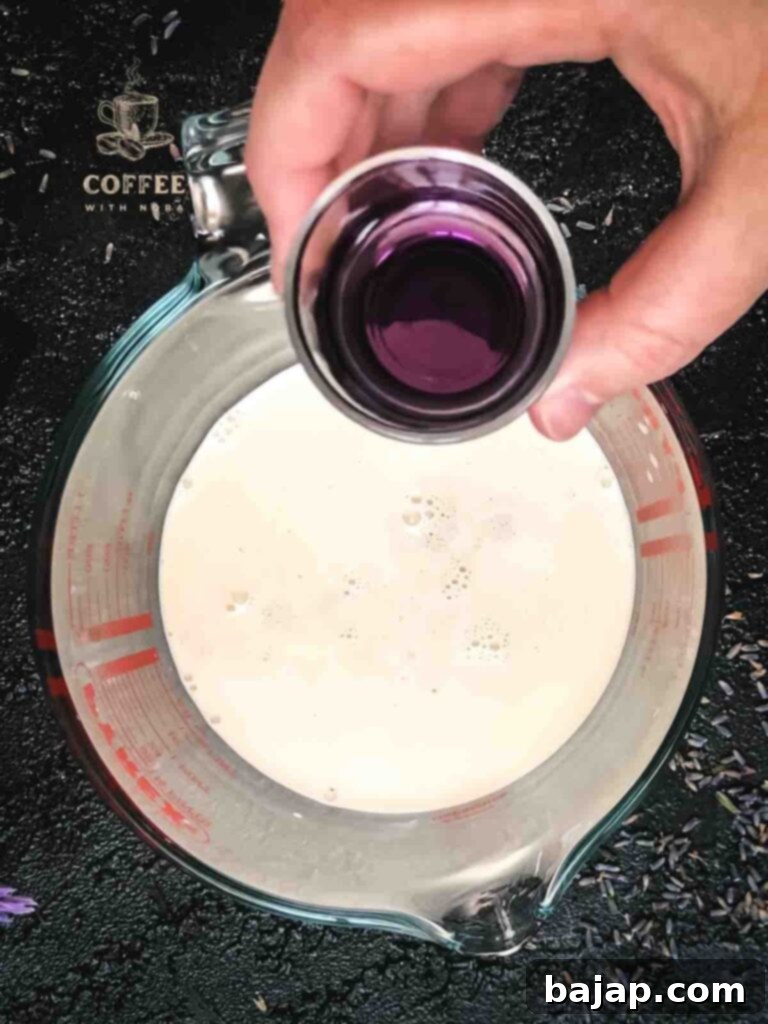 Adding lavender syrup to the lavender heavy cream mix