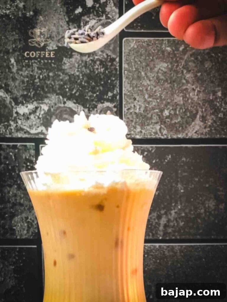 Lavender Dream Iced Latte 7 Sprinkle lavender buds on iced lavender latte