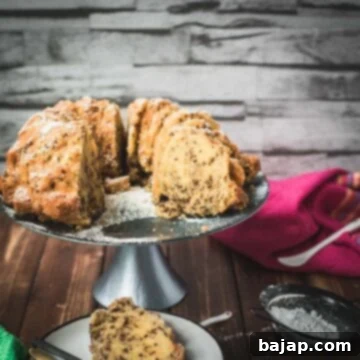 Vanilla Bean Bundt Cake with Dark Chocolate Drizzle 7 Delicious vanilla bundt cake with chocolate sprinkles, served on light blue cake stand.