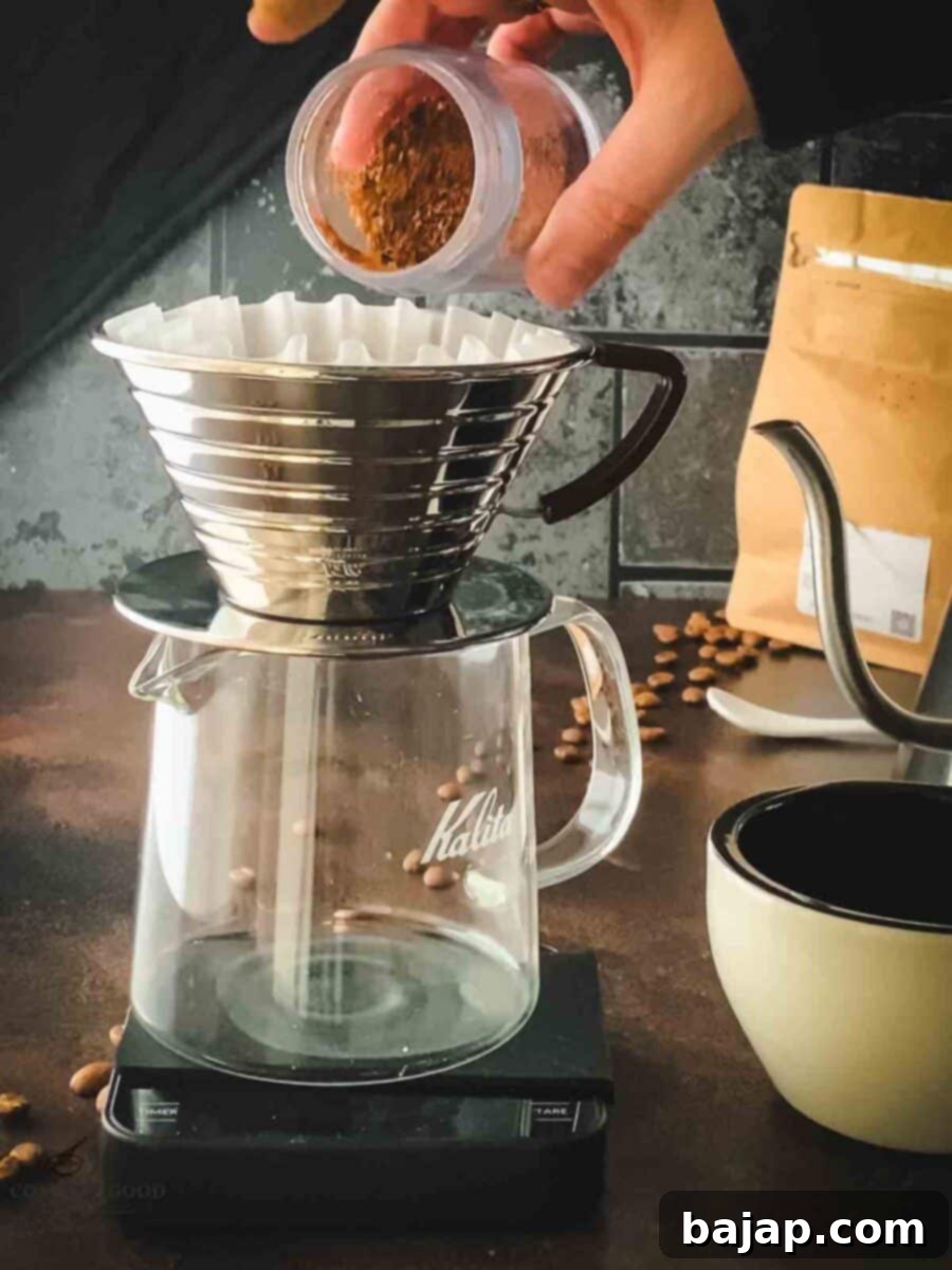 Add ground coffee to your prepared Kalita wave.