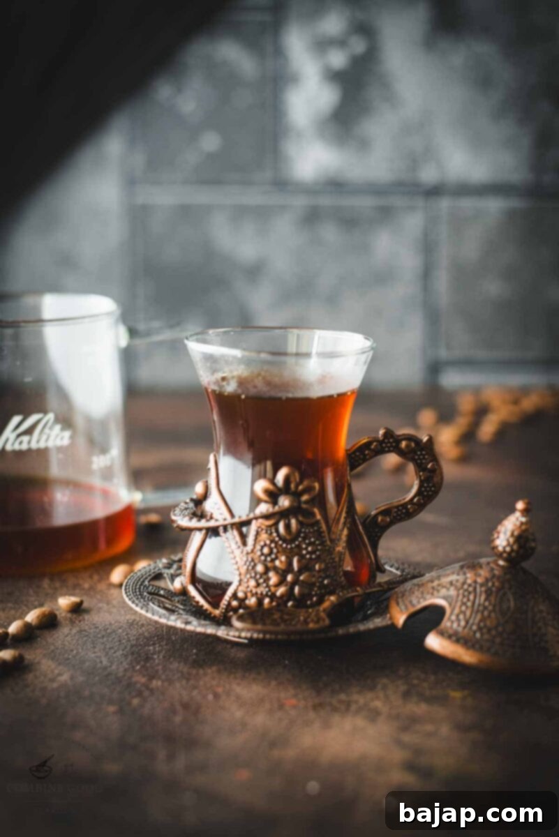 Gorgeous vintage glass filled with delicious pour over coffee, made with a Kalita wave.